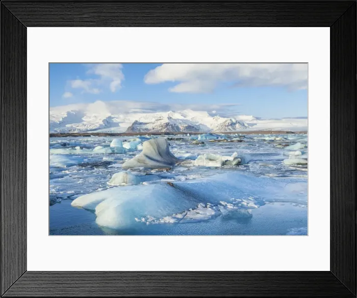 Framed Print : Mountains behind the icebergs locked in the frozen water of Jokulsarlon Iceberg Lagoon Framed Print : Mountains behind the icebergs locked in the frozen water of Jokulsarlon Iceberg Lagoon