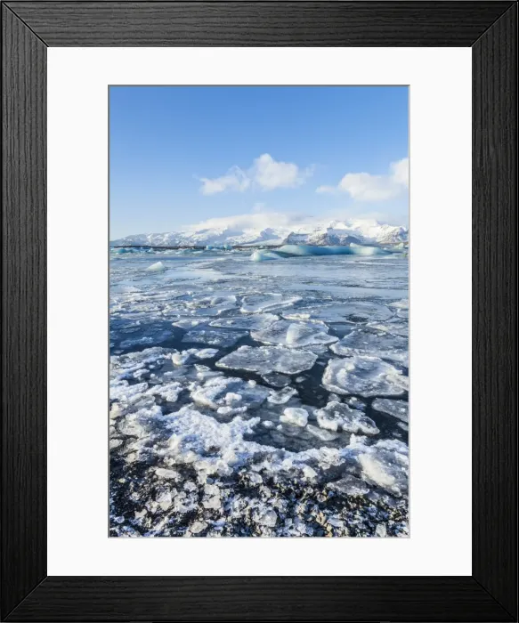 Framed Print : Mountains behind the frozen water of Jokulsarlon Iceberg Lagoon, Jokulsarlon, south east Iceland Framed Print : Mountains behind the frozen water of Jokulsarlon Iceberg Lagoon, Jokulsarlon, south east Iceland