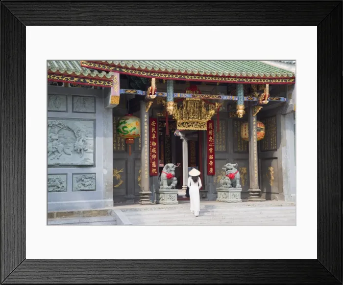 Framed Print : Woman wearing ao dai dress at Nghia An Hoi Quan Pagoda, Cholon, Ho Chi Minh City