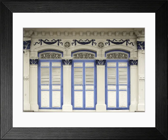 Framed Print : Close-up of traditional old houses with shuttered windows and decorative mouldings in Little India Framed Print : Close-up of traditional old houses with shuttered windows and decorative mouldings in Little India