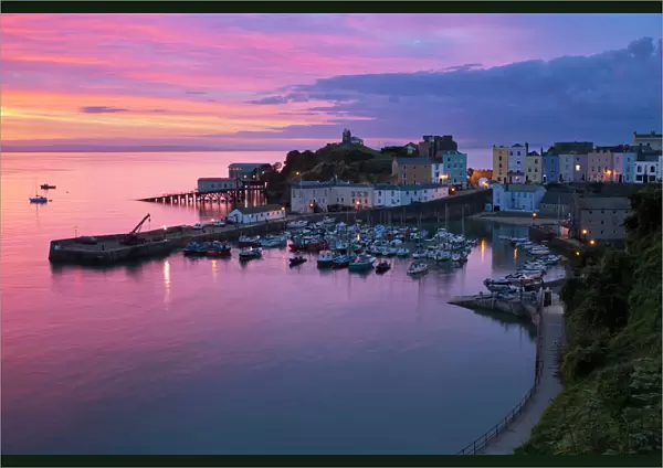 View over harbour and castle at dawn, Tenby, Carmarthen Bay, Pembrokeshire, Wales