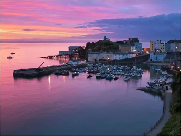 View over harbour and castle at dawn, Tenby, Carmarthen Bay, Pembrokeshire, Wales
