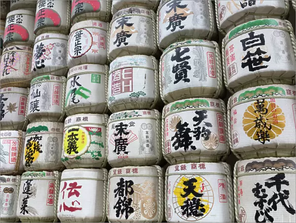 Barrels of Sake wrapped in straw at the Meiji Jingu, Tokyo, Japan, Asia