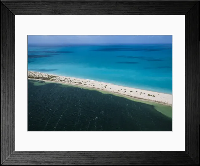 Framed Print : Aerial view of the color contrasts of Barbuda, tones change according to the current Framed Print : Aerial view of the color contrasts of Barbuda, tones change according to the current