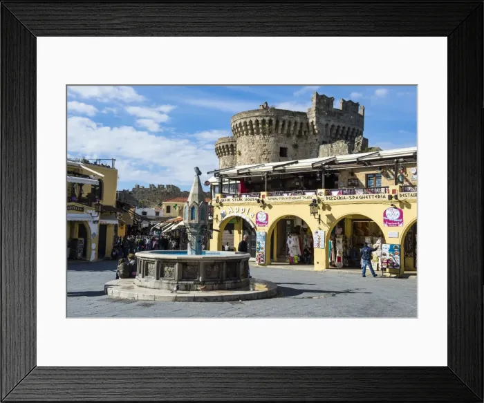 Framed Print : Medieval fountain at Hippokratous Square, the Medieval Old Town, UNESCO World Heritage Site Framed Print : Medieval fountain at Hippokratous Square, the Medieval Old Town, UNESCO World Heritage Site