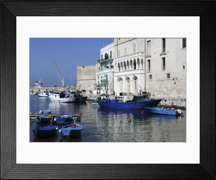 Framed Print : Blue wooden boats and fishing vessels in the walled harbour of Monopoli in Apulia Framed Print : Blue wooden boats and fishing vessels in the walled harbour of Monopoli in Apulia
