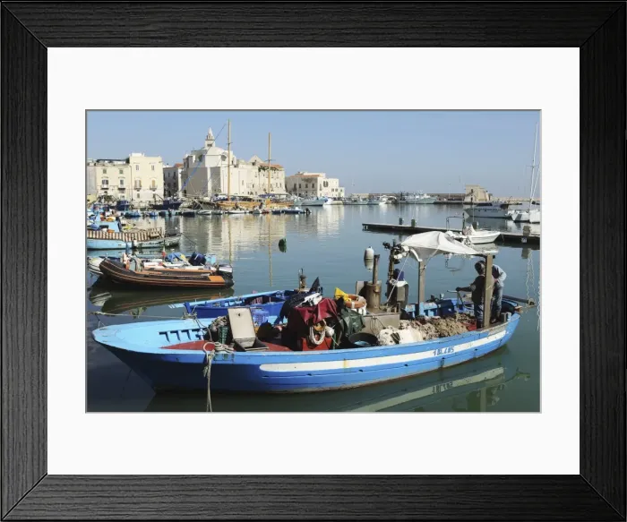 Framed Print : A fishing boat in the harbour by the cathedral of St. Nicholas the Pilgrim (San Nicola Framed Print : A fishing boat in the harbour by the cathedral of St. Nicholas the Pilgrim (San Nicola