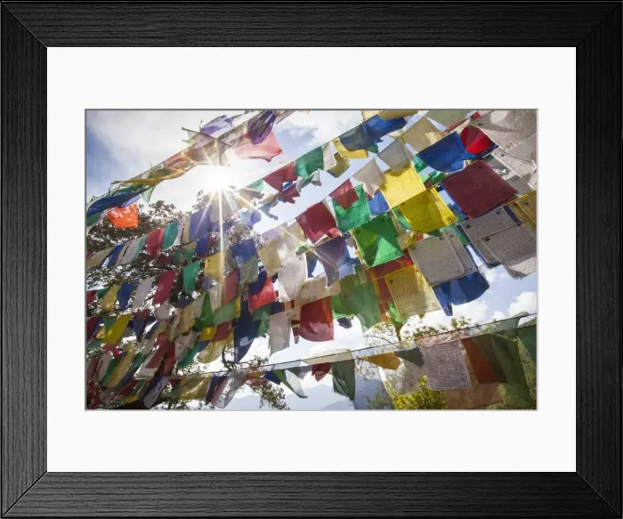 Framed Print : The Tibetan prayer flags made of colored cloth that are often hung on the top of Framed Print : The Tibetan prayer flags made of colored cloth that are often hung on the top of