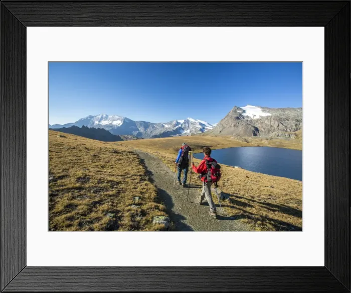 Framed Print : Hikers wallking along Rosset Lake, Gran Paradiso National Park, Alpi Graie (Graian Alps) Framed Print : Hikers wallking along Rosset Lake, Gran Paradiso National Park, Alpi Graie (Graian Alps)