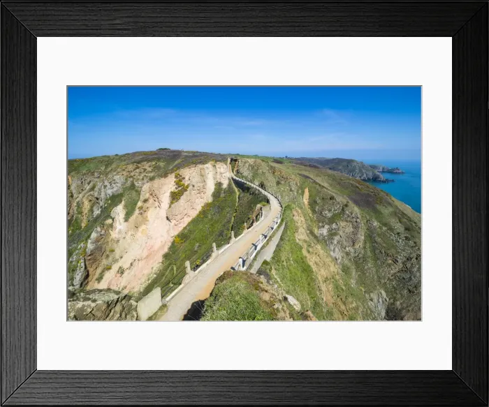Framed Print : Road connecting the narrow isthmus of Greater and Little Sark, Channel Islands, United Kingdom Framed Print : Road connecting the narrow isthmus of Greater and Little Sark, Channel Islands, United Kingdom