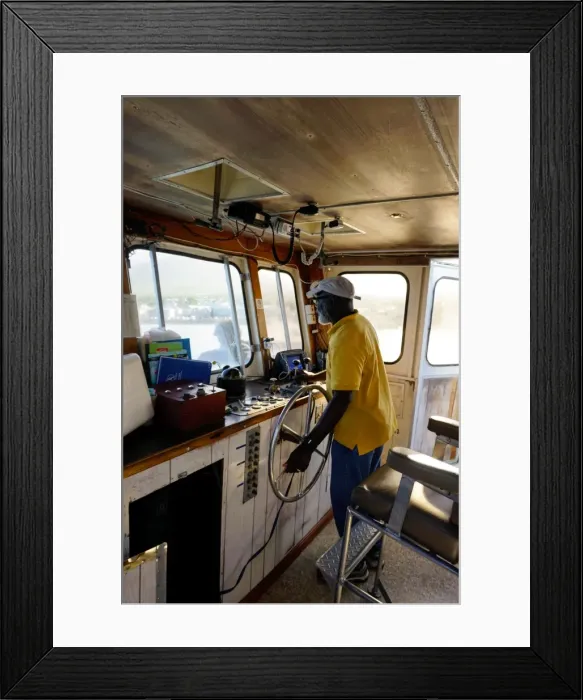 Framed Print : Ferry captain, St. Kitts and Nevis, Leeward Islands, West Indies, Caribbean, Central Framed Print : Ferry captain, St. Kitts and Nevis, Leeward Islands, West Indies, Caribbean, Central