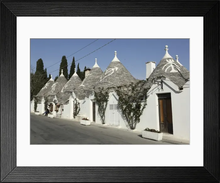 Framed Print : Row of 18th century trulli houses in the Rione Monte district, UNESCO World Heritage Site Framed Print : Row of 18th century trulli houses in the Rione Monte district, UNESCO World Heritage Site