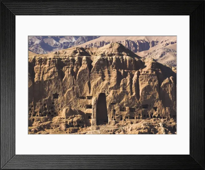 Framed Print : Empty niche in the cliff where one of the famous carved Buddhas once stood Framed Print : Empty niche in the cliff where one of the famous carved Buddhas once stood