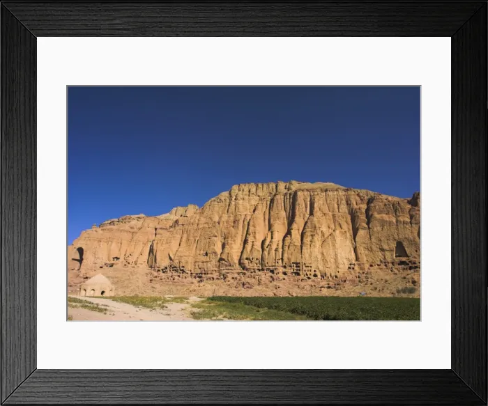 Framed Print : Cliffs with empty niches where the famous carved Buddhas once stood, destroyed by the Taliban in 2001, Bamiyan, UNESCO World Heritage Site, Bamiyan province Framed Print : Cliffs with empty niches where the famous carved Buddhas once stood, destroyed by the Taliban in 2001, Bamiyan, UNESCO World Heritage Site, Bamiyan province