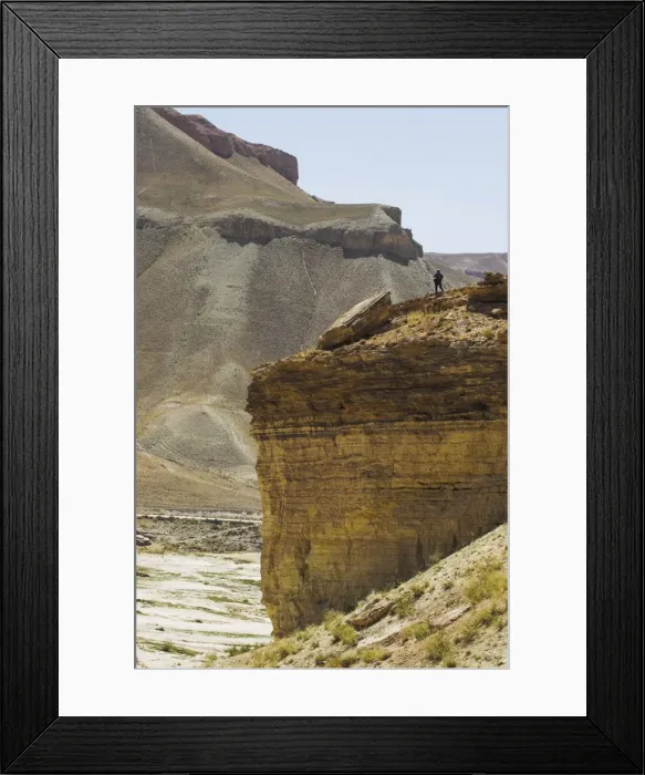 Framed Print : Tourist standing on rock cliff looking at Band-I-Zulfiqar the main lake Framed Print : Tourist standing on rock cliff looking at Band-I-Zulfiqar the main lake