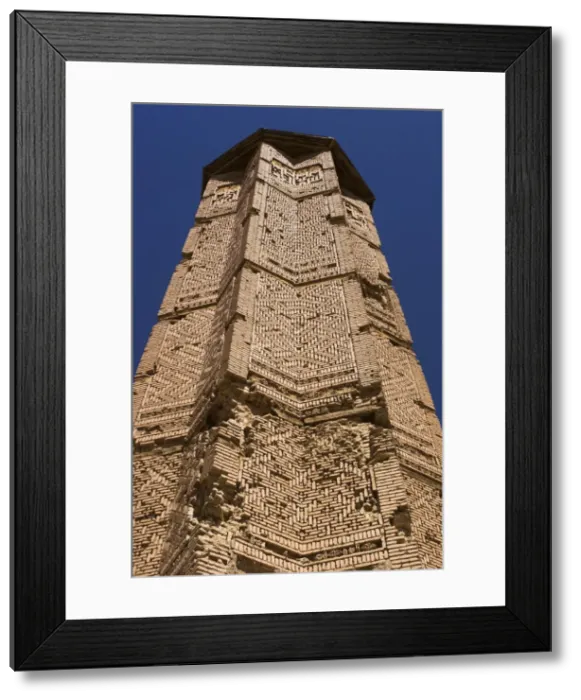 Framed Print : Minaret of Bahram Shah, with square Kufic and Noshki script, dating from the early 12th century Framed Print : Minaret of Bahram Shah, with square Kufic and Noshki script, dating from the early 12th century