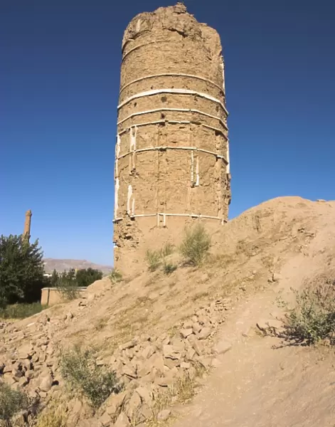 Partly destroyed minaret, one of several minarets in this complex, near Gaur Shads
