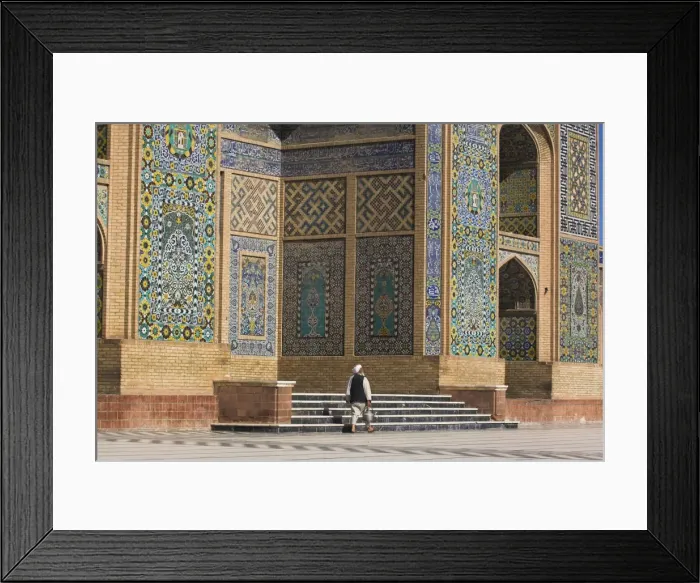 Framed Print : A man carrying a kettle walks past the Friday Mosque (Masjet-e Jam) (Masjid-e Jam) Framed Print : A man carrying a kettle walks past the Friday Mosque (Masjet-e Jam) (Masjid-e Jam)