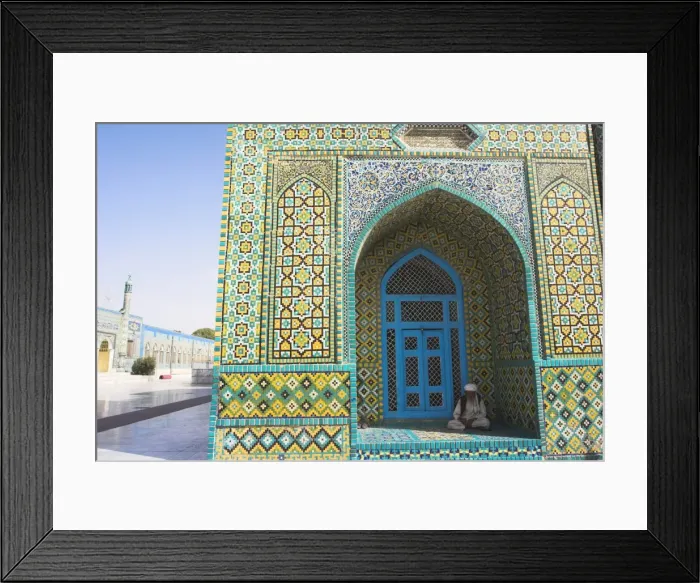 Framed Print : Pilgrim sits in a niche at the Shrine of Hazrat Ali, who was assassinated in 661 Framed Print : Pilgrim sits in a niche at the Shrine of Hazrat Ali, who was assassinated in 661