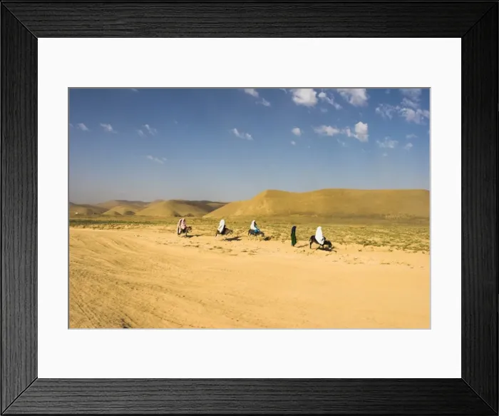 Framed Print : Women ride donkeys along side of road between Maimana and Mazar-I-Sharif Framed Print : Women ride donkeys along side of road between Maimana and Mazar-I-Sharif