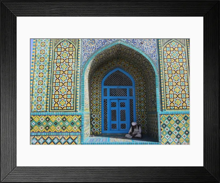 Framed Print : Pilgrim sits in a niche at the Shrine of Hazrat Ali, who was assassinated in 661 Framed Print : Pilgrim sits in a niche at the Shrine of Hazrat Ali, who was assassinated in 661