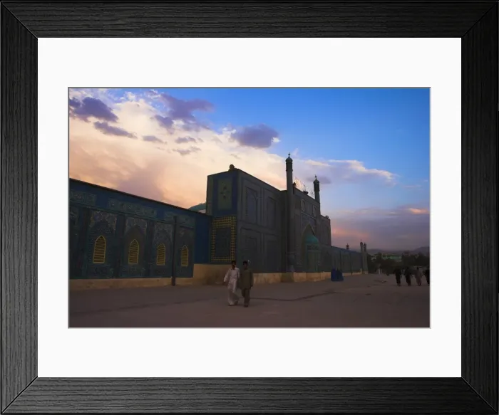 Framed Print : People walk at sunset past the Shrine of Hazrat Ali, who was assassinated in 661 Framed Print : People walk at sunset past the Shrine of Hazrat Ali, who was assassinated in 661