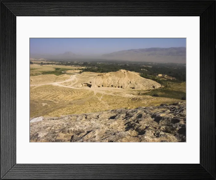 Framed Print : Buddhist caves at Takht-I-Rusam (Rustams throne), part of a stupa-monastery complex carved from rock dating from the Kushano-Sasanian period 4th-5th century AD. Samangan Province Framed Print : Buddhist caves at Takht-I-Rusam (Rustams throne), part of a stupa-monastery complex carved from rock dating from the Kushano-Sasanian period 4th-5th century AD. Samangan Province