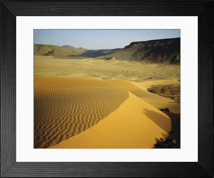 Framed Print : Dunes in canyon near Amguid, vehicle in the distance, Algeria, North Africa Framed Print : Dunes in canyon near Amguid, vehicle in the distance, Algeria, North Africa