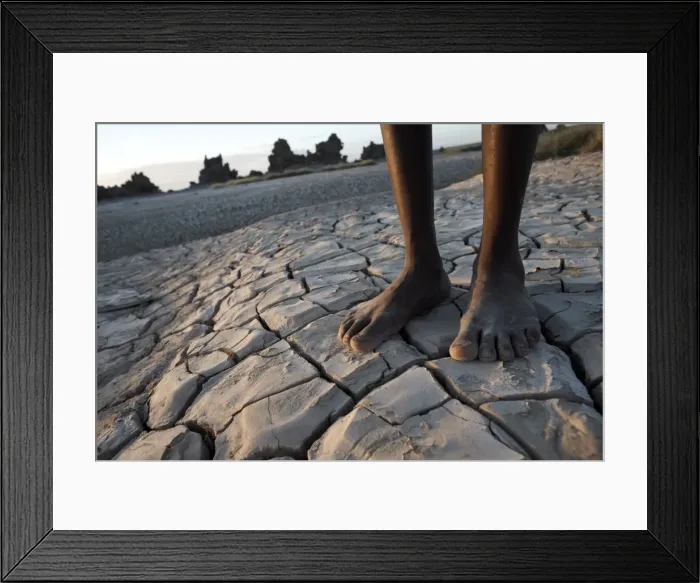 Framed Print : Standing in the desolate landscape of Lac Abbe, Djibouti, Africa Framed Print : Standing in the desolate landscape of Lac Abbe, Djibouti, Africa