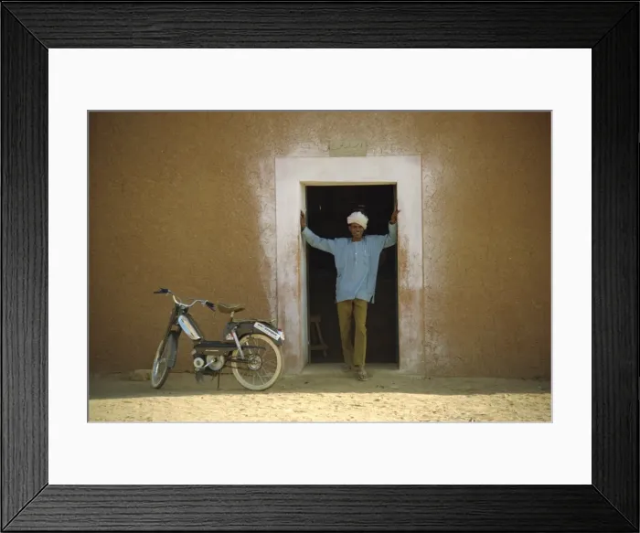 Framed Print : Portrait of man standing in doorway, Niger, Africa Framed Print : Portrait of man standing in doorway, Niger, Africa