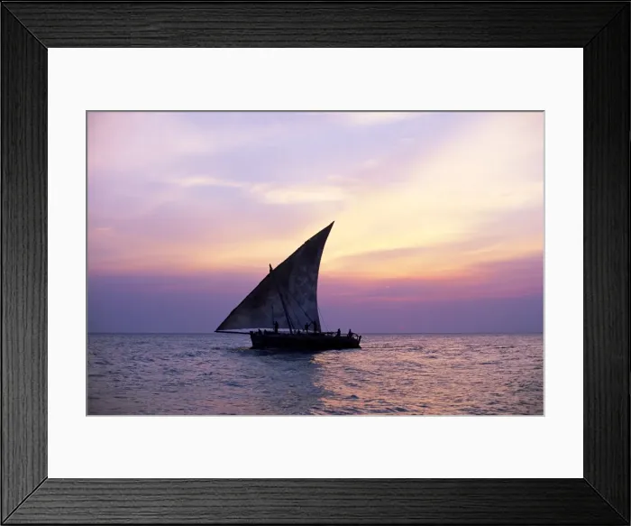 Framed Print : Dhow in silhouette on the Indian Ocean at sunset, off Stone Town, Zanzibar Framed Print : Dhow in silhouette on the Indian Ocean at sunset, off Stone Town, Zanzibar