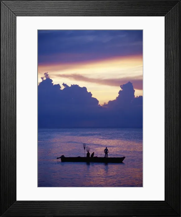 Framed Print : Fishing boat in the Indian Ocean at dawn, island of Zanzibar, Tanzania Framed Print : Fishing boat in the Indian Ocean at dawn, island of Zanzibar, Tanzania