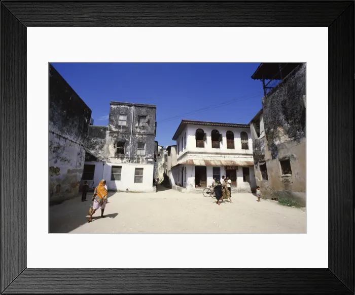 Framed Print : Typical white washed Arab buildings in the town market, Zanzibar, Tanzania Framed Print : Typical white washed Arab buildings in the town market, Zanzibar, Tanzania