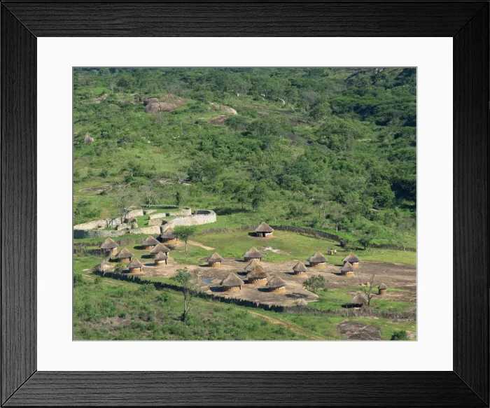 Framed Print : Nearby huts and Great Zimbabwe National Monument, UNESCO World Heritage Site Framed Print : Nearby huts and Great Zimbabwe National Monument, UNESCO World Heritage Site