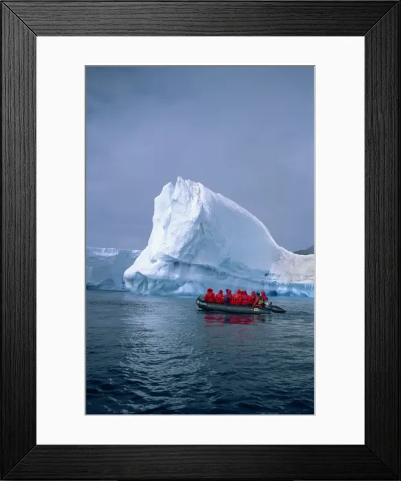 Framed Print : Tourists exploring icebergs by dinghy, Antarctica, Polar Regions Framed Print : Tourists exploring icebergs by dinghy, Antarctica, Polar Regions