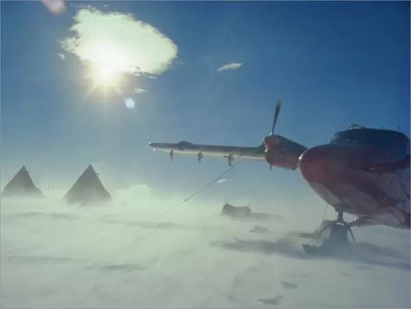 Aircraft on the ground in a blizzard, Antarctica