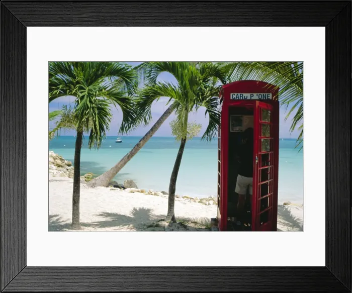 Framed Print : English telephone box on the beach, Dickensons Bay, North-East coast Framed Print : English telephone box on the beach, Dickensons Bay, North-East coast
