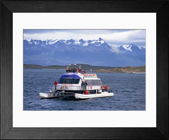 Framed Print : Tourists on a catamaran on a wildlife tour in the Beagle Channel off Argentina Framed Print : Tourists on a catamaran on a wildlife tour in the Beagle Channel off Argentina