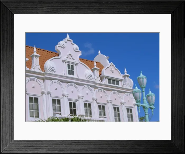 Framed Print : Pastel facade of mock Dutch colonial building, Oranjestad, Aruba, Antilles Framed Print : Pastel facade of mock Dutch colonial building, Oranjestad, Aruba, Antilles