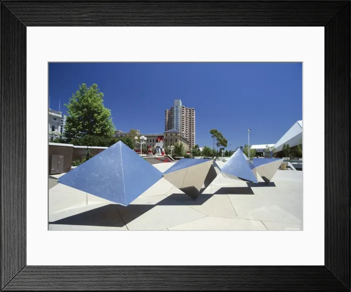 Framed Print : Modern sculpture between Parliament House and the Festival Centre on North Terrace at the heart of South Australias capital with the Hyatt Hotel beyond, Adelaide, South Australia Framed Print : Modern sculpture between Parliament House and the Festival Centre on North Terrace at the heart of South Australias capital with the Hyatt Hotel beyond, Adelaide, South Australia
