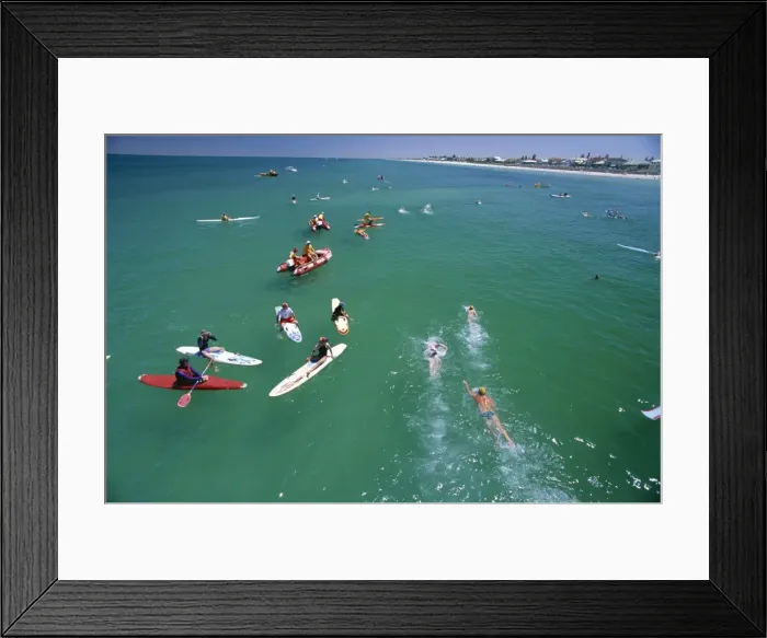 Framed Print : Competitors leaving Grange Pier at the Henley and Grange swimming race that is swum between the piers of these two seaside suburbs of Adelaide, South Australia Framed Print : Competitors leaving Grange Pier at the Henley and Grange swimming race that is swum between the piers of these two seaside suburbs of Adelaide, South Australia