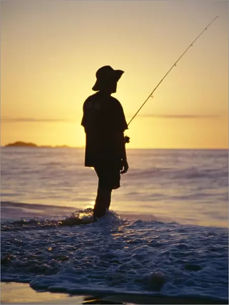 Fishing from the beach at sunrise, Australia, Pacific