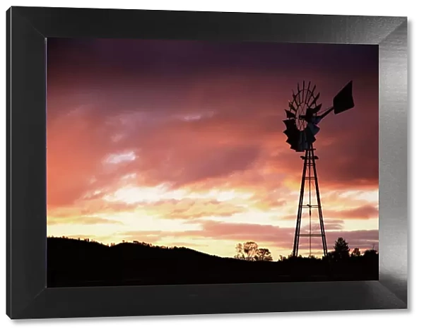 Windmill (wind pump) at sunset, South Australia, Australia, Pacific