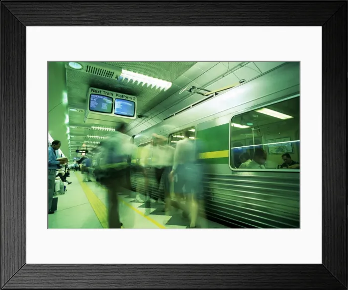 Framed Print : Passengers boarding train at Parliament Station in the City of Melbourne Framed Print : Passengers boarding train at Parliament Station in the City of Melbourne