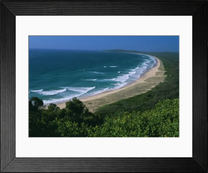 Framed Print : Looking south from Cape Byron to Tallow Beach, a surfing spot east of the resort of Byron Bay in the northeast of New South Framed Print : Looking south from Cape Byron to Tallow Beach, a surfing spot east of the resort of Byron Bay in the northeast of New South