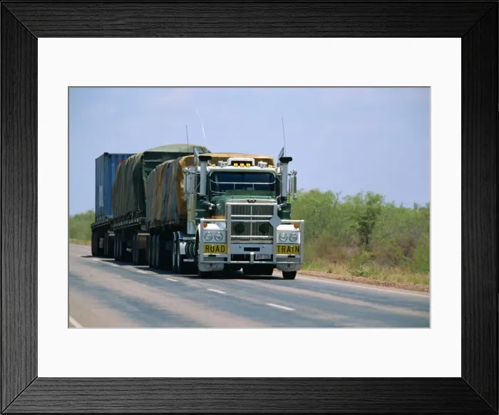 Framed Print : A road train on the Stuart Highway between Darwin and Threeways in the Northern Territory of Australia Framed Print : A road train on the Stuart Highway between Darwin and Threeways in the Northern Territory of Australia