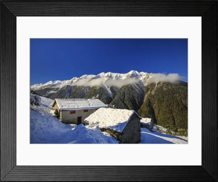 Framed Print : Mountain houses framed by snowy peaks, San Salvatore, Livrio Valley, Orobie Alps Framed Print : Mountain houses framed by snowy peaks, San Salvatore, Livrio Valley, Orobie Alps