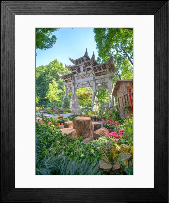 Framed Print : Traditional Chinese stone gate, a place to rest amidst lush vegetation and floral Framed Print : Traditional Chinese stone gate, a place to rest amidst lush vegetation and floral