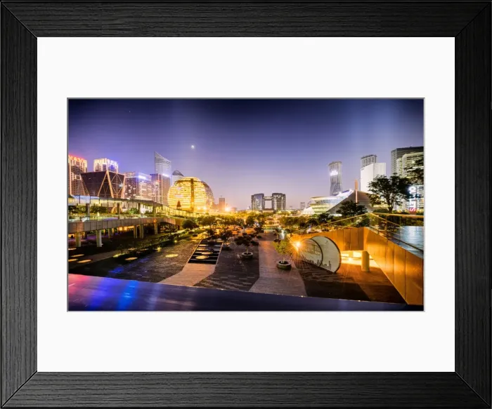 Framed Print : Nightly display of light, color and futuristic architecture in Jianggan district of Hangzhou Framed Print : Nightly display of light, color and futuristic architecture in Jianggan district of Hangzhou