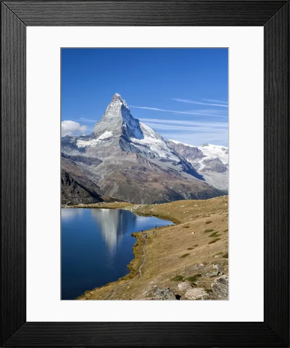 Framed Print : Hikers walking on the path beside the Stellisee with the Matterhorn reflected, Zermatt Framed Print : Hikers walking on the path beside the Stellisee with the Matterhorn reflected, Zermatt